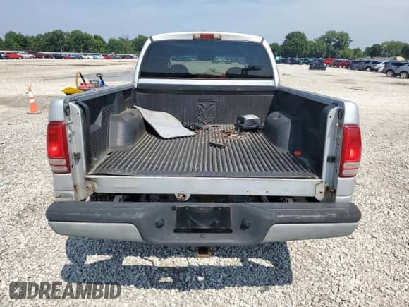 2003 Dodge Dakota SLT z VIN 1D7HG48N73S127509, wystawiony jako Copart lot #65515595 z przebiegiem 161 928 mil mil oraz Szkoda całkowita • Salvage title. Historia ofert i sprzedaży dostępna na DreamBid. Obrazek 6.