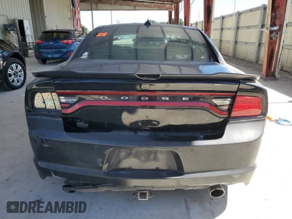 2013 Dodge Charger SRT-8 с VIN 2C3CDXEJ5DH597566, выставлен на аукционе Copart как лот 89835925 с пробегом 79 370 миль миль и Списание • Salvage title. История ставок и продаж доступна на DreamBid. Изображение 6.