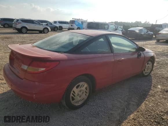 2000 Saturn SC z VIN 1G8ZY1272YZ194371, wystawiony jako Copart lot #74937784 z przebiegiem Nie podano mil oraz Czysty tytuł • Clean title. Historia ofert i sprzedaży dostępna na DreamBid. Obrazek 3.