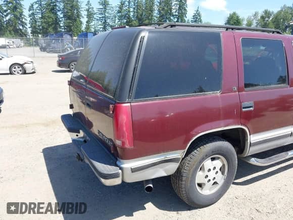 1995 Chevrolet Tahoe z VIN 1GNEK13K2SJ424433, wystawiony jako IAAI lot #42455752 z przebiegiem 221 469 mil mil oraz . Historia ofert i sprzedaży dostępna na DreamBid. Obrazek 12.