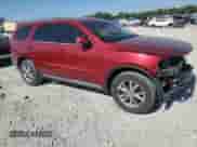 2014 Dodge Durango Limited with VIN 1C4RDJDG9EC976437, listed as a Copart auction lot 81308365 with 227,223 mi miles and Salvage title. Bid and sale history available at DreamBid. Image 4.
