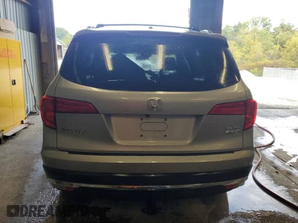 2016 Honda Pilot Elite with VIN 5FNYF6H0XGB049730, listed as a Copart auction lot 80723945 with 128,969 mi miles and Salvage title. Bid and sale history available at DreamBid. Image 6.