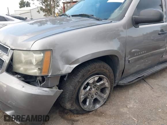 2007 Chevrolet Suburban LT with VIN 3GNFC16007G191138, listed as a IAAI auction lot 41425886 with 150,250 mi miles and . Bid and sale history available at DreamBid. Image 14.