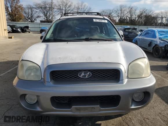 2002 Hyundai Santa Fe GLS z VIN KM8SC73D02U247565, wystawiony jako Copart lot #82780014 z przebiegiem Nie podano mil oraz Szkoda całkowita • Salvage title. Historia ofert i sprzedaży dostępna na DreamBid. Obrazek 5.