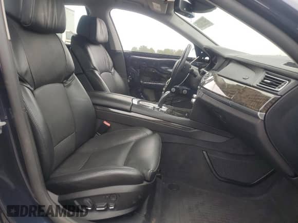2012 BMW 7 Series 750i xDrive with VIN WBAKC6C52CDX99493, listed as a Copart auction lot 69933035 with 117,809 mi miles and Salvage title. Bid and sale history available at DreamBid. Image 7.