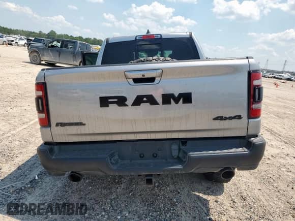 2020 Ram 1500 Rebel z VIN 1C6SRFLT4LN403520, wystawiony jako Copart lot #70288825 z przebiegiem 70 547 mil mil oraz Szkoda całkowita • Salvage title. Historia ofert i sprzedaży dostępna na DreamBid. Obrazek 6.