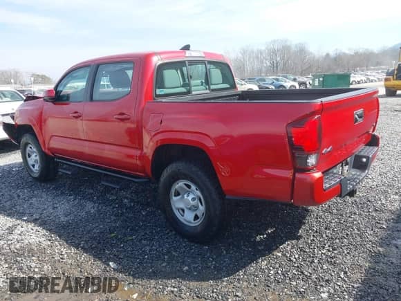 2018 Toyota Tacoma SR with VIN 5TFCZ5AN5JX156019, listed as a IAAI auction lot 38810875 with 76,805 mi miles and . Bid and sale history available at DreamBid. Image 3.