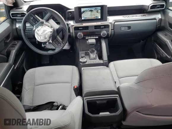 2024 Toyota Tacoma SR5 with VIN 3TMLB5JN0RM071045, listed as a Copart auction lot 70163855 with 8,616 mi miles and Salvage title. Bid and sale history available at DreamBid. Image 8.