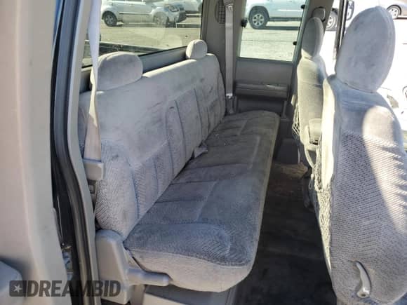 1998 GMC Sierra 1500 z VIN 2GTEC19M2W1506886, wystawiony jako Copart lot #82636144 z przebiegiem 113 755 mil mil oraz Szkoda całkowita • Salvage title. Historia ofert i sprzedaży dostępna na DreamBid. Obrazek 10.