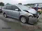 2015 Toyota Sienna XLE with VIN 5TDYK3DC0FS584442, listed as a Copart auction lot 70875035 with 183,330 mi miles and Salvage title. Bid and sale history available at DreamBid. Image 4.