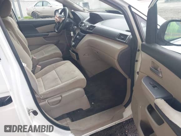 2011 Honda Odyssey LX with VIN 5FNRL5H28BB028618, listed as a IAAI auction lot 43339792 with 144,001 mi miles and . Bid and sale history available at DreamBid. Image 5.