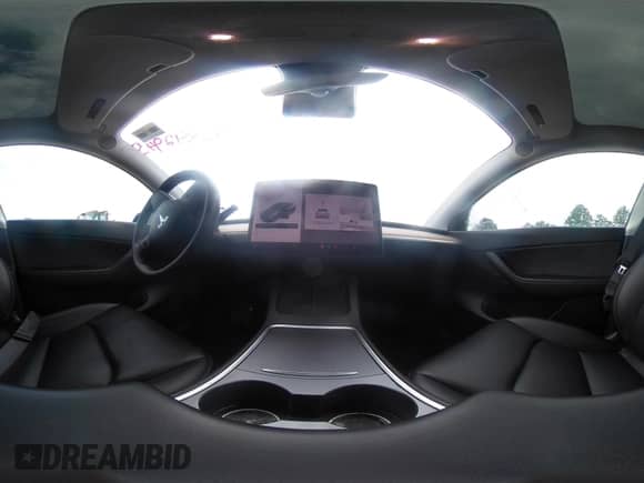 2021 Tesla Model Y Long Range with VIN 5YJYGDEE1MF217624, listed as a IAAI auction lot 42842945 with 58,610 mi miles and . Bid and sale history available at DreamBid. Image 21.