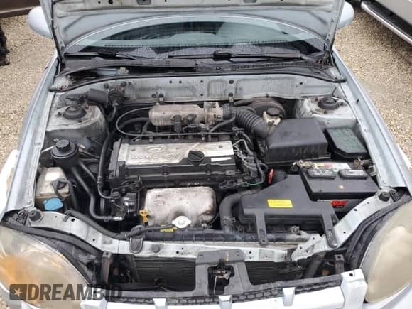 2005 Hyundai Accent GLS z VIN KMHCG35C75U354574, wystawiony jako Copart lot #74931444 z przebiegiem 141 013 mil mil oraz Szkoda całkowita • Salvage title. Historia ofert i sprzedaży dostępna na DreamBid. Obrazek 11.