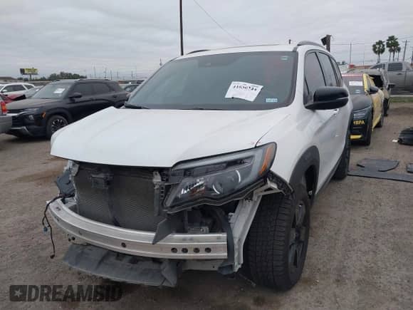 2022 Honda Pilot TrailSport with VIN 5FNYF6H83NB099405, listed as a IAAI auction lot 41630244 with 51,341 mi miles and . Bid and sale history available at DreamBid. Image 18.