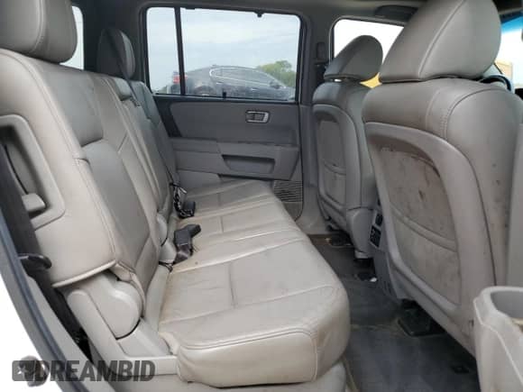2012 Honda Pilot Touring with VIN 5FNYF3H91CB037960, listed as a Copart auction lot 69235005 with 165,677 mi miles and Salvage title. Bid and sale history available at DreamBid. Image 11.