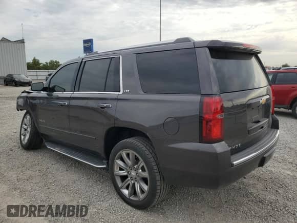 2016 Chevrolet Tahoe LTZ с VIN 1GNSKCKC8GR185844, выставлен на аукционе Copart как лот 71619715 с пробегом 170 389 миль миль и Списание • Salvage title. История ставок и продаж доступна на DreamBid. Изображение 2.