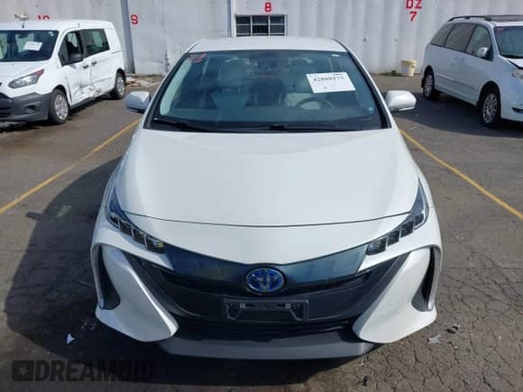 2018 Toyota Prius Plus z VIN JTDKARFP5J3077090, wystawiony jako IAAI lot #42888175 z przebiegiem 192 157 mil mil oraz . Historia ofert i sprzedaży dostępna na DreamBid. Obrazek 13.