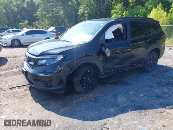 2022 Honda Pilot TrailSport with VIN 5FNYF6H84NB085965, listed as a IAAI auction lot 42556978 with 85,611 mi miles and . Bid and sale history available at DreamBid. Image 18.