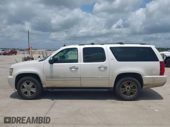 2009 Chevrolet Suburban LTZ z VIN 1GNFK36399R234676, wystawiony jako IAAI lot #42321922 z przebiegiem 419 096 mil mil oraz . Historia ofert i sprzedaży dostępna na DreamBid. Obrazek 14.