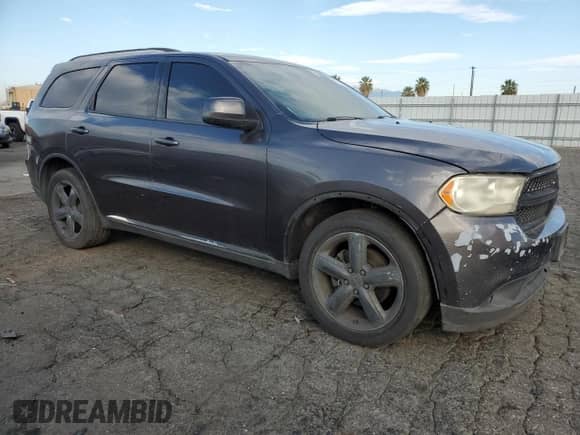 2013 Dodge Durango SXT with VIN 1C4RDHAG0DC694375, listed as a Copart auction lot 82360515 with 219,201 mi miles and Salvage title. Bid and sale history available at DreamBid. Image 4.