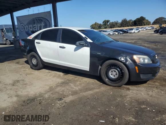2013 Chevrolet Caprice with VIN 6G1MK5R20DL828983, listed as a Copart auction lot 57186815 with 119,478 mi miles and Clean title. Bid and sale history available at DreamBid. Image 4.