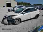 2013 Ford Focus Titanium z VIN 1FADP3J25DL168564, wystawiony jako Copart lot #80250465 z przebiegiem 111 505 mil mil oraz Szkoda całkowita • Salvage title. Historia ofert i sprzedaży dostępna na DreamBid. Obrazek 1.