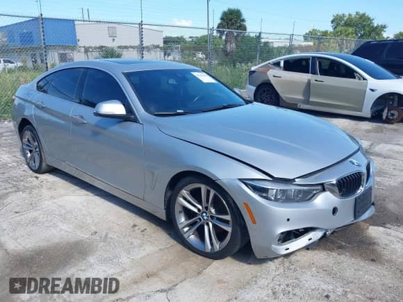 2019 BMW 4 Series 430i xDrive z VIN WBA4J3C50KBL08541, wystawiony jako IAAI lot #43156193 z przebiegiem 109 733 mil mil oraz . Historia ofert i sprzedaży dostępna na DreamBid. Obrazek 1.