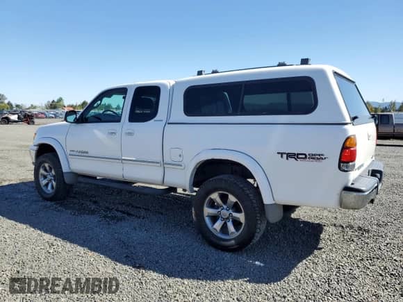 2001 Toyota Tundra Limited z VIN 5TBBT48191S126028, wystawiony jako Copart lot #80312915 z przebiegiem 230 773 mil mil oraz Czysty tytuł • Clean title. Historia ofert i sprzedaży dostępna na DreamBid. Obrazek 2.