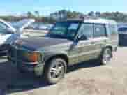 2002 Land Rover Discovery Cloth with VIN SALTY124X2A770417, listed as a IAAI auction lot 43514769 with 165,445 mi miles and . Bid and sale history available at DreamBid. Image 2.