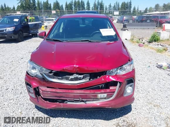 2018 Chevrolet Sonic LT with VIN 1G1JD6SG1J4120415, listed as a IAAI auction lot 42719704 with 96,341 mi miles and . Bid and sale history available at DreamBid. Image 6.