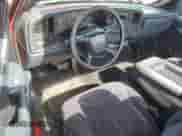 1999 GMC Sierra 1500 SL with VIN 1GTEC14W3XZ536612, listed as a Copart auction lot 61235565 with 176,211 mi miles and Salvage title. Bid and sale history available at DreamBid. Image 8.