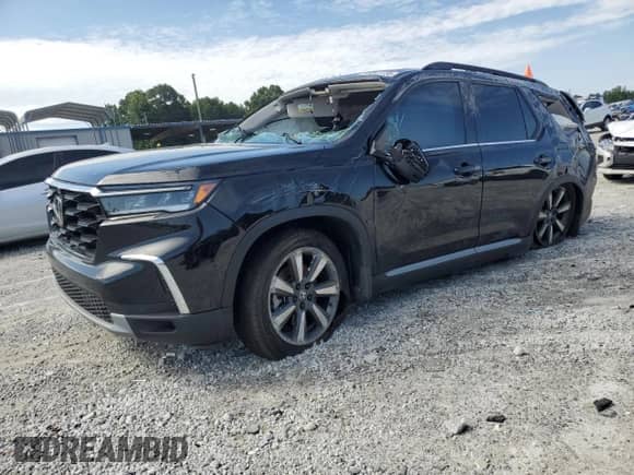 2024 Honda Pilot Elite with VIN 5FNYG1H81RB045879, listed as a Copart auction lot 65841735 with 9,985 mi miles and Salvage title. Bid and sale history available at DreamBid. Image 1.