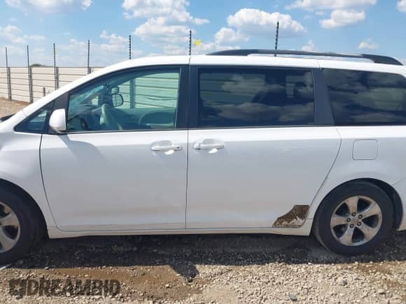 2013 Toyota Sienna LE AAS with VIN 5TDKK3DC4DS301138, listed as a IAAI auction lot 43215517 with 245,377 mi miles and . Bid and sale history available at DreamBid. Image 15.