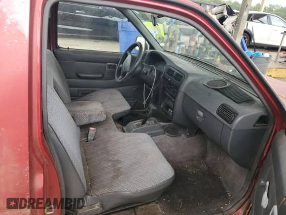 1997 Nissan Frontier XE with VIN 1N6SD11S3VC336876, listed as a Copart auction lot 67527435 with 156,448 mi miles and Salvage title. Bid and sale history available at DreamBid. Image 10.