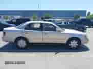 1995 Toyota Camry LE z VIN 4T1GK12E0SU860849, wystawiony jako IAAI lot #42358373 z przebiegiem 162 463 mil mil oraz . Historia ofert i sprzedaży dostępna na DreamBid. Obrazek 13.