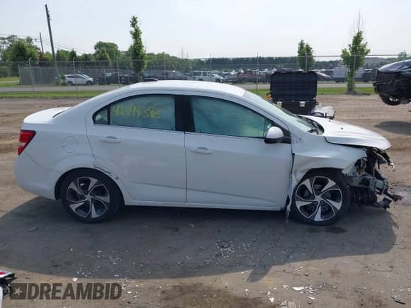 2017 Chevrolet Sonic Premier with VIN 1G1JF5SB5H4118976, listed as a IAAI auction lot 42499383 with 144,035 mi miles and . Bid and sale history available at DreamBid. Image 14.