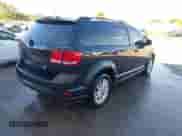 2013 Dodge Journey SXT z VIN 3C4PDCBB6DT576445, wystawiony jako IAAI lot #43317291 z przebiegiem 172 498 mil mil oraz . Historia ofert i sprzedaży dostępna na DreamBid. Obrazek 4.