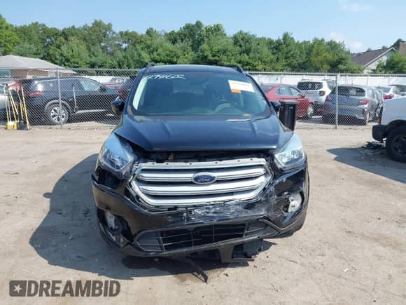 2018 Ford Escape SE with VIN 1FMCU9GD8JUC47268, listed as a IAAI auction lot 42941602 with 87,617 mi miles and . Bid and sale history available at DreamBid. Image 12.