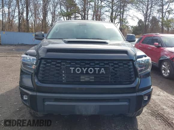 2021 Toyota Tundra SR5 with VIN 5TFDY5F10MX964425, listed as a IAAI auction lot 41843735 with 108,005 mi miles and . Bid and sale history available at DreamBid. Image 12.