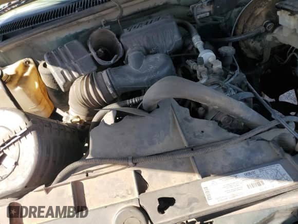 1998 GMC Sierra 1500 z VIN 1GTEC19W4WE521888, wystawiony jako Copart lot #53161505 z przebiegiem 985 004 mil mil oraz Szkoda całkowita • Salvage title. Historia ofert i sprzedaży dostępna na DreamBid. Obrazek 12.