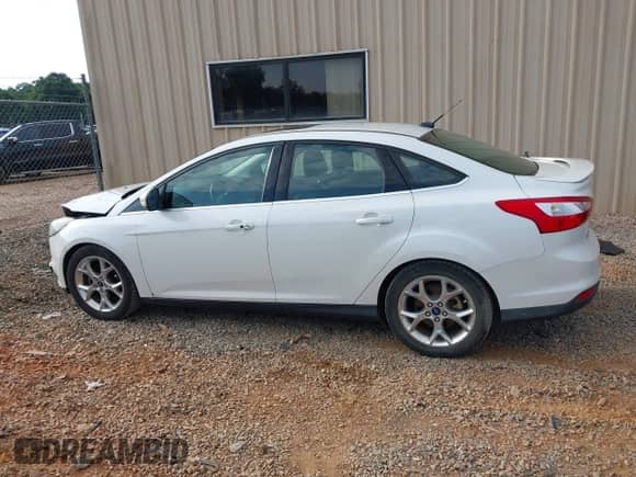 2012 Ford Focus Titanium with VIN 1FAHP3J2XCL346937, listed as a IAAI auction lot 42857040 with 170,544 mi miles and . Bid and sale history available at DreamBid. Image 14.
