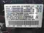 2010 Honda Pilot Touring with VIN 5FNYF3H97AB008623, listed as a IAAI auction lot 42797309 with 312,005 mi miles and . Bid and sale history available at DreamBid. Image 9.