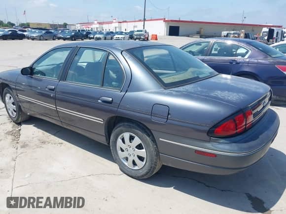 1996 Chevrolet Lumina z VIN 2G1WL52M6T9124713, wystawiony jako IAAI lot #42306378 z przebiegiem 140 750 mil mil oraz . Historia ofert i sprzedaży dostępna na DreamBid. Obrazek 3.