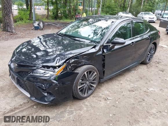 2018 Toyota Camry XSE z VIN 4T1B61HK4JU148516, wystawiony jako IAAI lot #42895081 z przebiegiem 58 828 mil mil oraz . Historia ofert i sprzedaży dostępna na DreamBid. Obrazek 2.