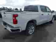 2025 Chevrolet Silverado 1500 Custom with VIN 3GCPKBEK6SG229571, listed as a IAAI auction lot 43299191 with 10,593 mi miles and . Bid and sale history available at DreamBid. Image 4.