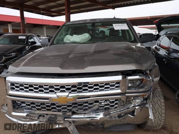 2014 Chevrolet Silverado 1500 LT with VIN 3GCUKREH6EG381743, listed as a IAAI auction lot 41583823 with 141,671 mi miles and . Bid and sale history available at DreamBid. Image 13.