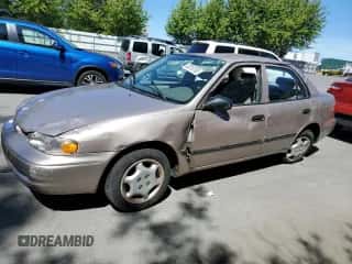 2000 Chevrolet Prizm z VIN 1Y1SK5283YZ412788, wystawiony jako Copart lot #63516155 z przebiegiem Nie podano mil oraz Szkoda całkowita • Salvage title. Historia ofert i sprzedaży dostępna na DreamBid. Obrazek 1.