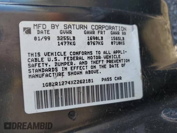 1999 Saturn SC with VIN 1G8ZR1274XZ262181, listed as a Copart auction lot 75931774 with Not provided miles and Salvage title. Bid and sale history available at DreamBid. Image 12.