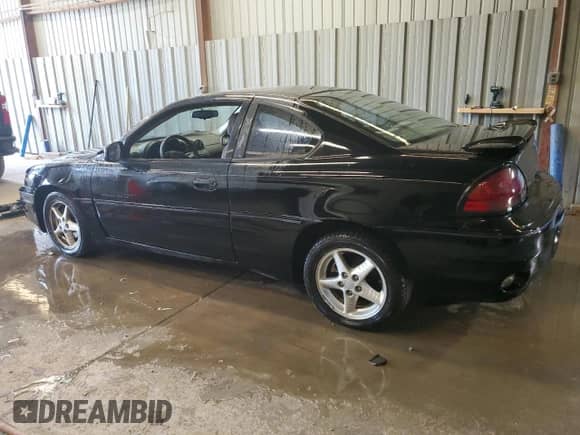 1999 Pontiac Grand Am GT z VIN 1G2NW12E0XM864802, wystawiony jako Copart lot #81447165 z przebiegiem 116 530 mil mil oraz Szkoda całkowita • Salvage title. Historia ofert i sprzedaży dostępna na DreamBid. Obrazek 2.
