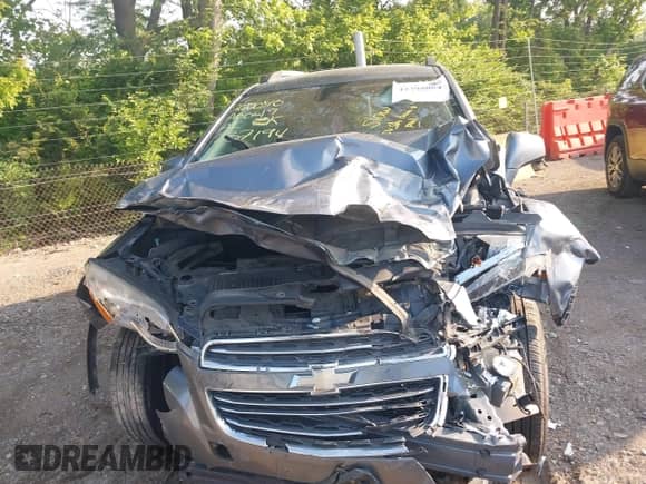 2015 Chevrolet Trax LT z VIN KL7CJRSBXFB137194, wystawiony jako IAAI lot #42395864 z przebiegiem 141 136 mil mil oraz . Historia ofert i sprzedaży dostępna na DreamBid. Obrazek 13.